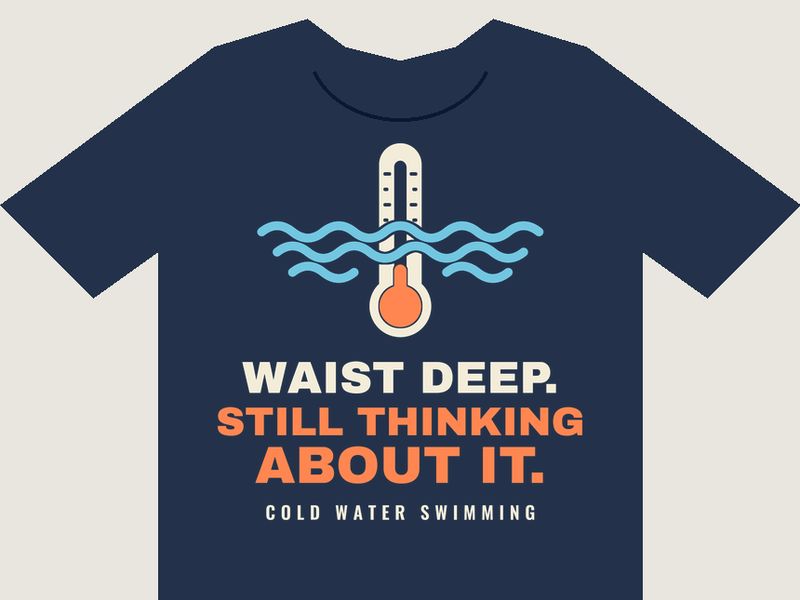 Navy T-shirt preview with a cream thermometer, its short orange reading below three rows of pale blue waves, above the words WAIST DEEP. STILL THINKING ABOUT IT. in cream and orange, and COLD WATER SWIMMING in small letters.